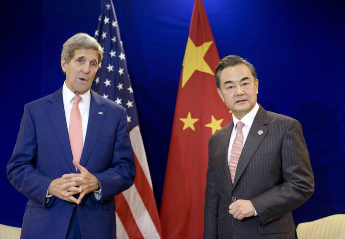 Ngoại trưởng Mỹ John Kerry hội đàm với Ngoại trưởng Trung Quốc Vương Nghị hôm 5-8          Ảnh: REUTERS