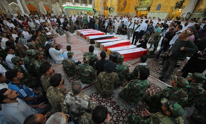 10 binh sĩ Iraq bị giết ở trại Speicher tháng 6-2014. Ảnh: AP