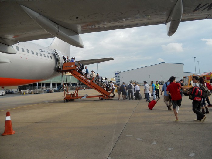 Có nên mở rộng sân bay Tân Sơn Nhất ở TP HCM vẫn là điều đang gây tranh cãi Ảnh: TẤN THẠNH