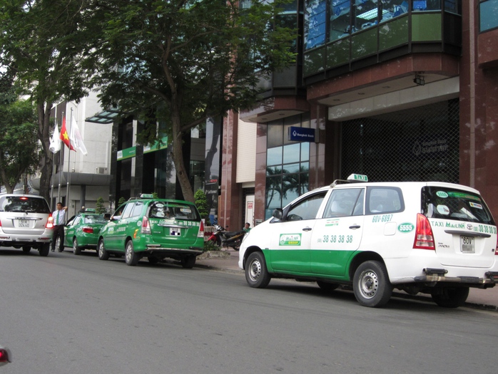 Một taxi mang biển số tỉnh hoạt động tại TP HCM Ảnh: Gia Minh