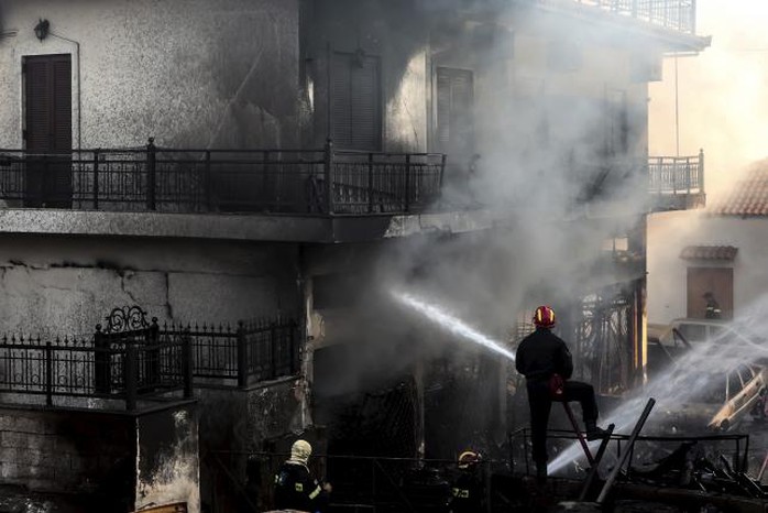 Tổng cộng 52 vụ cháy được ghi nhận từ đảo Evia, Đông Bắc Athens cho tới phía Nam bán đảo Peloponnese. Ảnh: Reuters