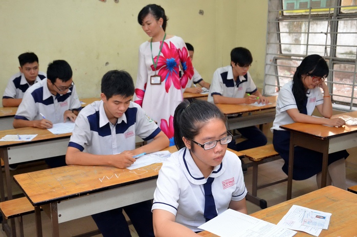 Học sinh thi tốt nghiệp THPT năm 2014 tại Trường THPT Mạc Đĩnh Chi, quận 6, TP HCM Ảnh: Tấn Thạnh