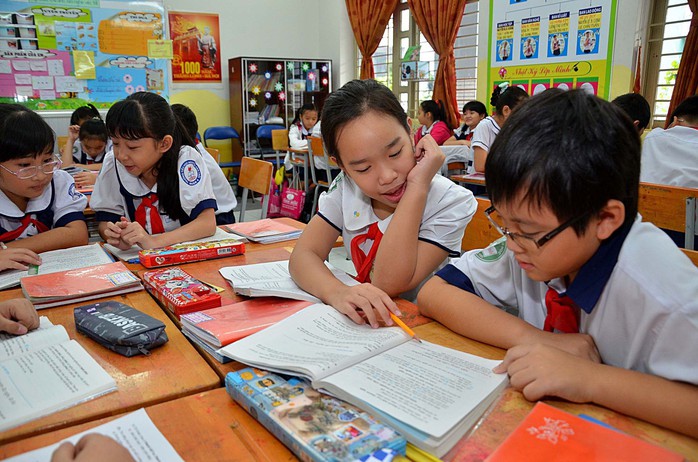 Học sinh lớp 5, Trường Tiểu học Nguyễn Văn Trỗi (TP HCM) trong giờ học văn Ảnh: TẤN THẠNH