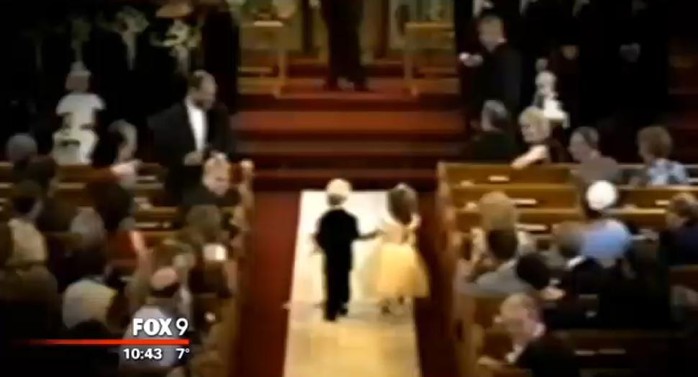 Briggs Fussy and Brittney Husbyn walk down the aisle in 1995.