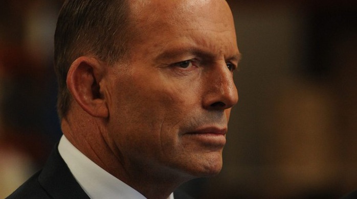 Embattled Prime Minister of Australia Tony Abbott is shown during a tour of the Timbermate manufacturing facility in Mitcham today.