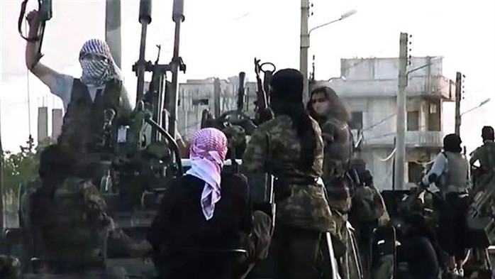 This file photo shows ISIL Takfiri militants at an undisclosed location in Syria.