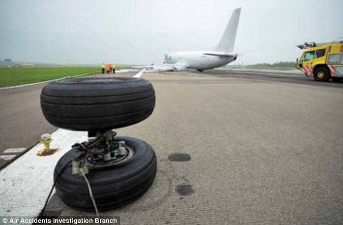 The cargo planes left main landing gear detached due to heat damage to chrome plating, a report said