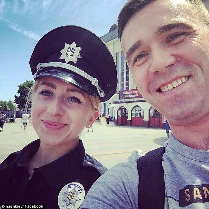 Photogenic police: Attractive new officers have been encouraged to take selfies with members of the public as part of a PR drive to win back trust, and the images have since gone viral