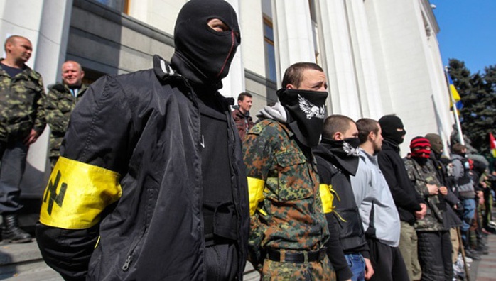 Militants from the Right Sector stand outside Kiev