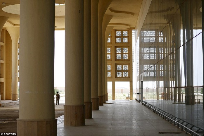 The airports only visitors are cleaners and security guards (pictured) who have been hired to patrol the grounds