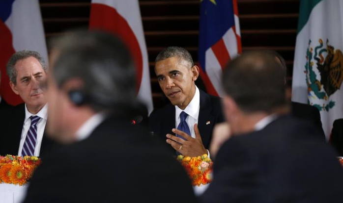 Tổng thống Mỹ Barack Obama gặp gỡ lãnh đạo các nước tham gia TPP tại Bắc Kinh tháng 11-2014 Ảnh: REUTERS