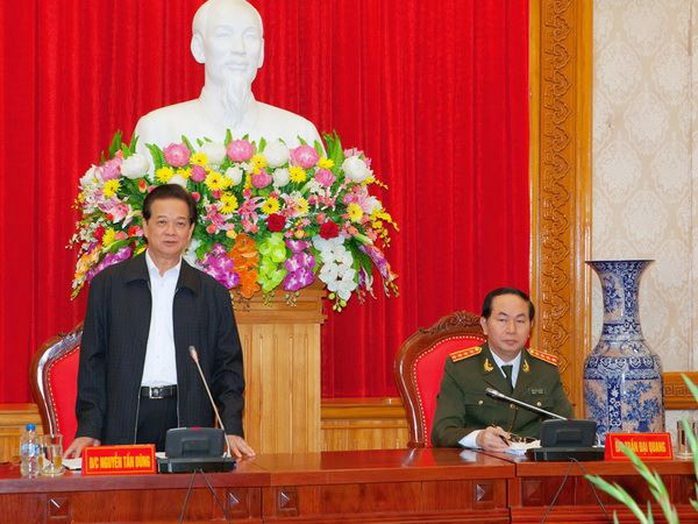 Thủ tướng Nguyễn Tấn Dũng làm việc với Đảng ủy Công an Trung ương và lãnh đạo Bộ Công an về tình hình, kết quả công tác Công an năm 2014; phương hướng, nhiệm vụ công tác năm 2015 - Ảnh: TTXVN