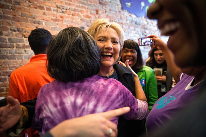 Hillary Clinton was hugged by a supporter during a surprise visit on Saturday to Yo Mama’s in Birmingham, Ala.