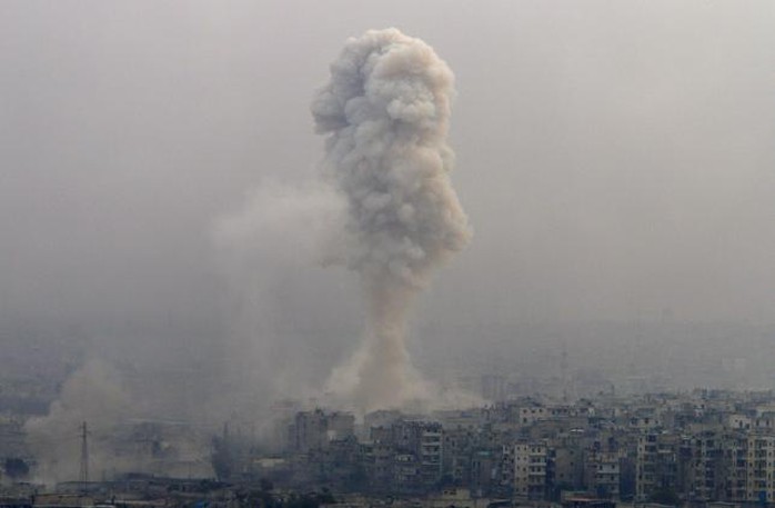 
Chiến sự tại TP Aleppo ngày 5-12. Ảnh: REUTERS
