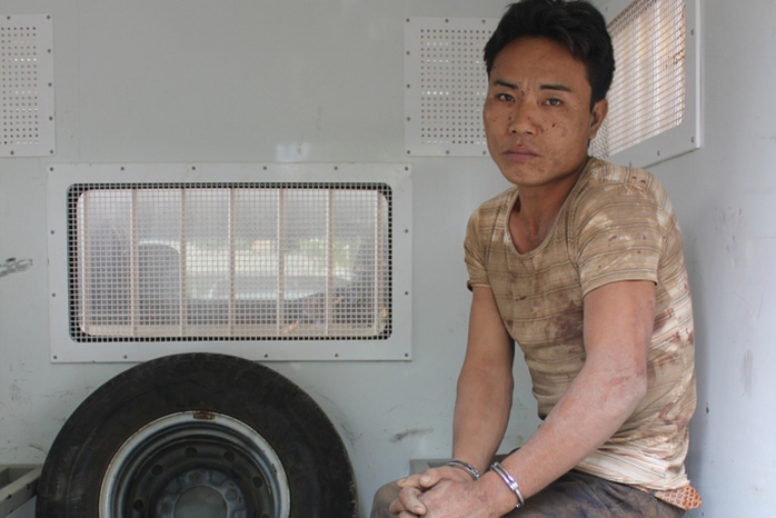 Nghi phạm Phù Minh Tuấn bị lực lượng chức năng bắt giữ Ảnh: Đoàn Tuấn