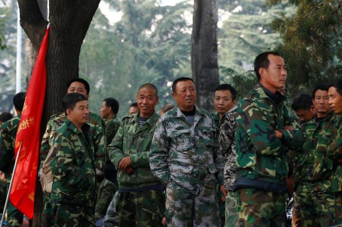 
Các cựu binh tại cuộc biểu tình ở thủ đô Bắc Kinh hôm 11-10 Ảnh: Reuters
