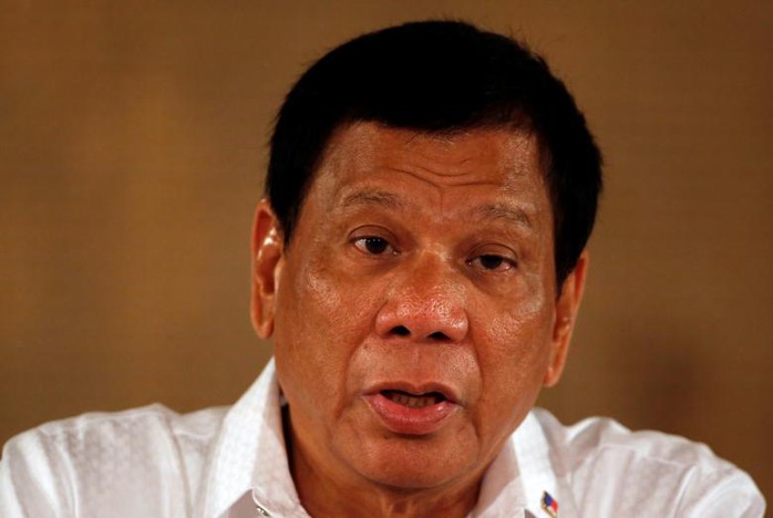 Tổng thống Duterte tại một cuộc họp báo ở Manila ngày 13-3 Ảnh: REUTERS