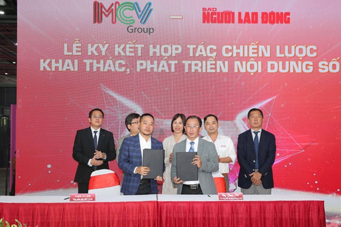 Báo Người Lao Động và MCV Group ký kết hợp tác - Ảnh 1.