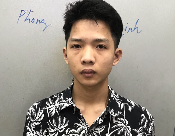 Gã thanh niên táo tợn đột nhập Công ty CP Tài chính Vietbank ở quận Tân Bình  - Ảnh 1.