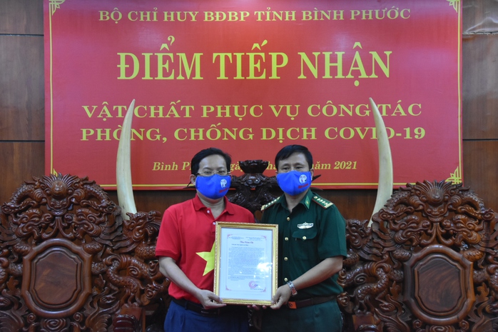 Cờ Tổ quốc biên cương đến với vùng biên giới Bình Phước - Ảnh 4.