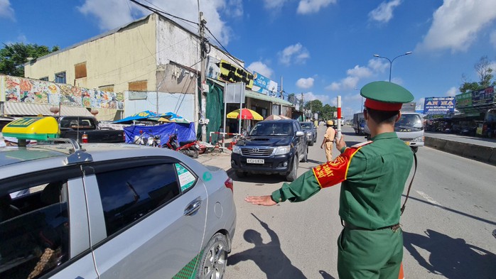 TP HCM: Tạm dừng hoạt động các chốt, trạm kiểm dịch phòng chống dịch Covid-19 - Ảnh 1.