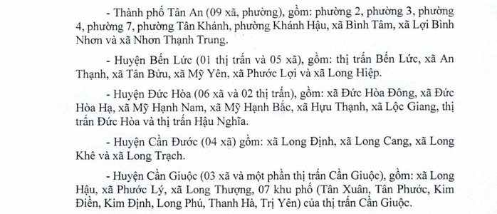 Long An và Đồng Tháp áp dụng giãn cách xã hội nhiều địa bàn - Ảnh 2.