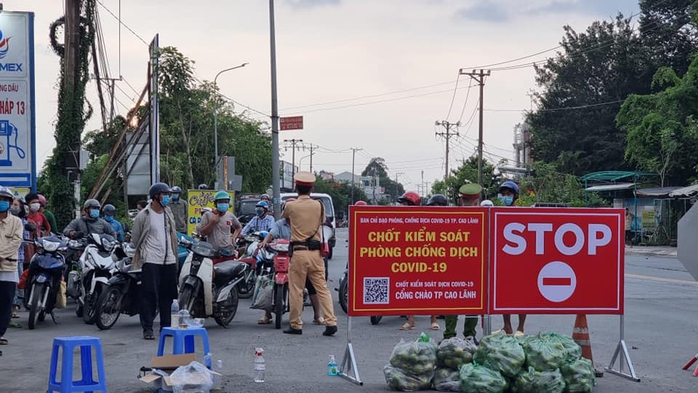 38 công nhân ở Đồng Tháp nghi mắc Covid-19, An Giang thêm 10 ca - Ảnh 1.