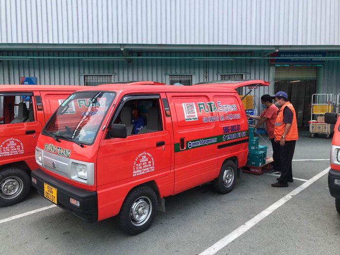 Doanh nghiệp vận tải hàng hóa vượt khó mùa dịch, kiên trì phục vụ người dân - Ảnh 2. Doanh nghiệp vận tải hàng hóa vượt khó mùa dịch, kiên trì phục vụ người dân - Ảnh 2.