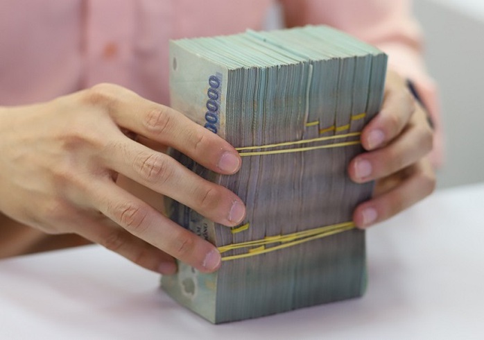 Vì sao các ngân hàng đua nhau miễn phí dịch vụ? - Ảnh 2. Vì sao các ngân hàng đua nhau miễn phí dịch vụ? - Ảnh 2.