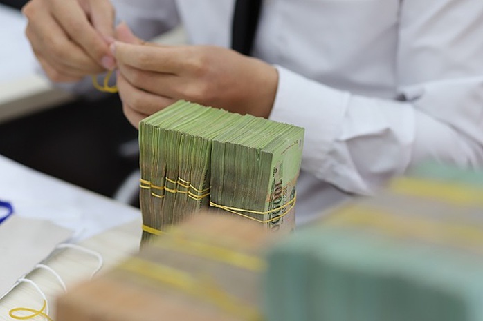 Người vay mua nhà, mua xe trong gánh nặng trả nợ ngân hàng - Ảnh 1. Người vay mua nhà, mua xe trong gánh nặng trả nợ ngân hàng - Ảnh 1.