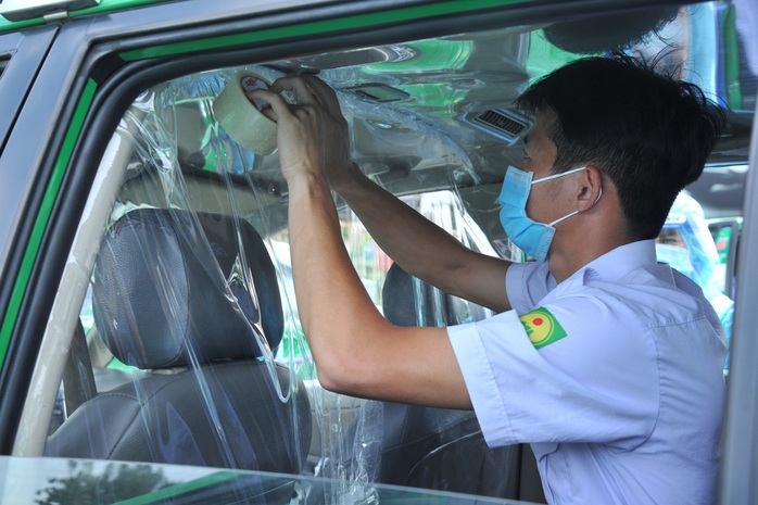 132 tình nguyện viên tham gia cấp cứu F0 bằng taxi - Ảnh 1.