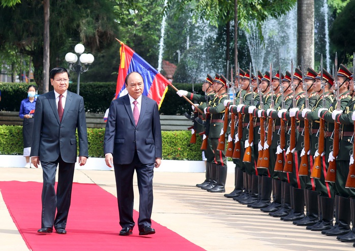 Việt - Lào ký kết và trao 14 văn kiện hợp tác - Ảnh 1.