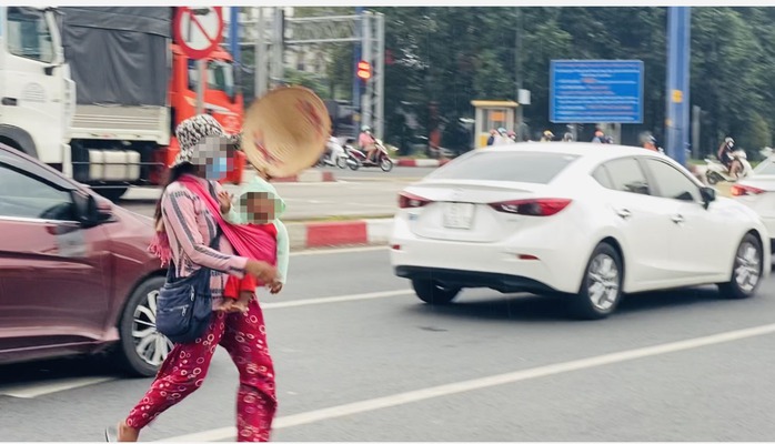 Tái diễn nạn ăn xin trên đường phố - Ảnh 2.