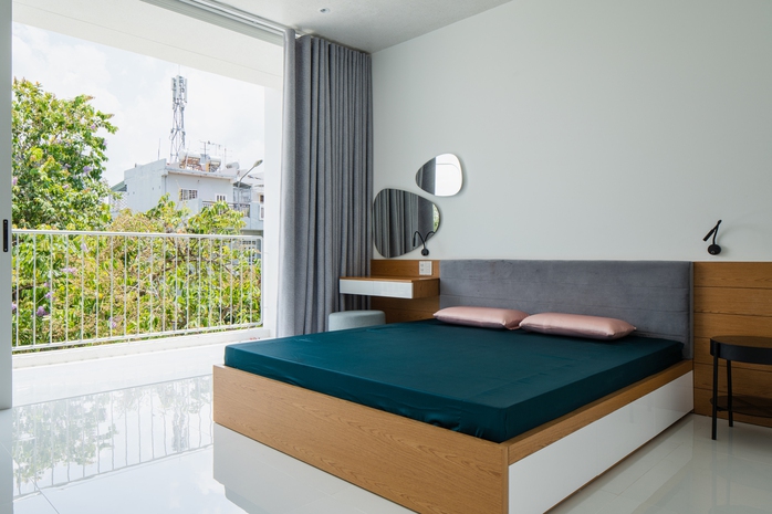 Căn nhà màu trắng và những đường cong uốn lượn - Ảnh 7. Căn nhà màu trắng và những đường cong uốn lượn - Ảnh 7.