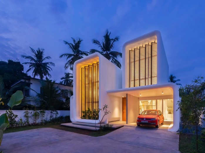 Độc đáo ngôi nhà hình chiếc điện thoại di động, dùng cửa chớp trục xoay để thông gió - Ảnh 6.