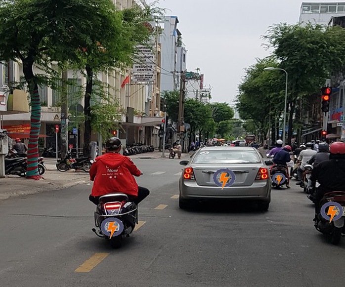 Giá xăng tăng cao, lái xe công nghệ tính đường chuyển sang xe máy điện - Ảnh 4.