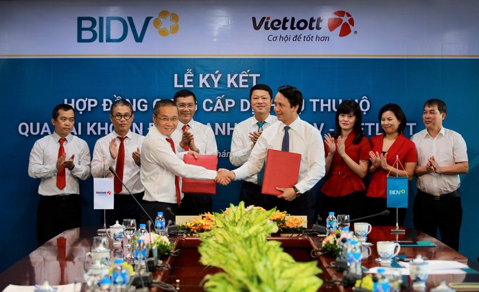BIDV và Vietlott ký kết hợp đồng dịch vụ thu hộ qua tài khoản định danh - Ảnh 1. BIDV và Vietlott ký kết hợp đồng dịch vụ thu hộ qua tài khoản định danh - Ảnh 1.