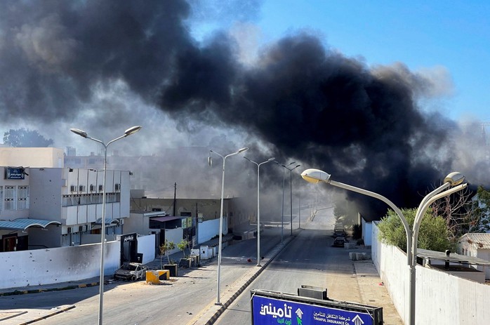 Libya: Đụng độ đẫm máu ngày này qua ngày khác ở thủ đô Tripoli - Ảnh 1.