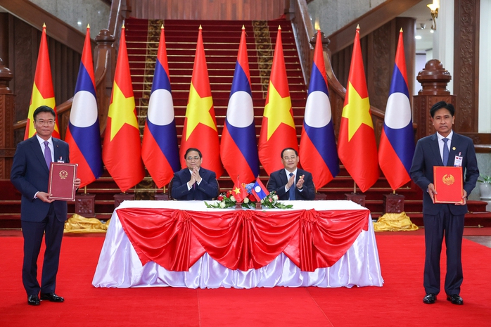 Việt Nam - Lào nâng tầm hợp tác kinh tế - Ảnh 1.