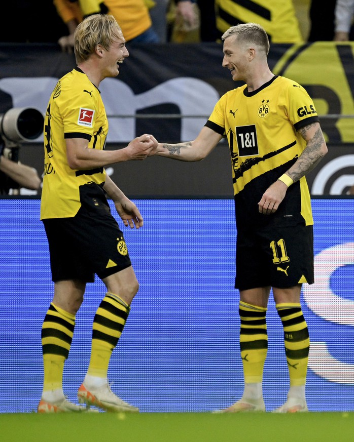Ngược dòng kịch tính, Borussia Dortmund áp sát ngôi đầu Bundesliga - Ảnh 1.