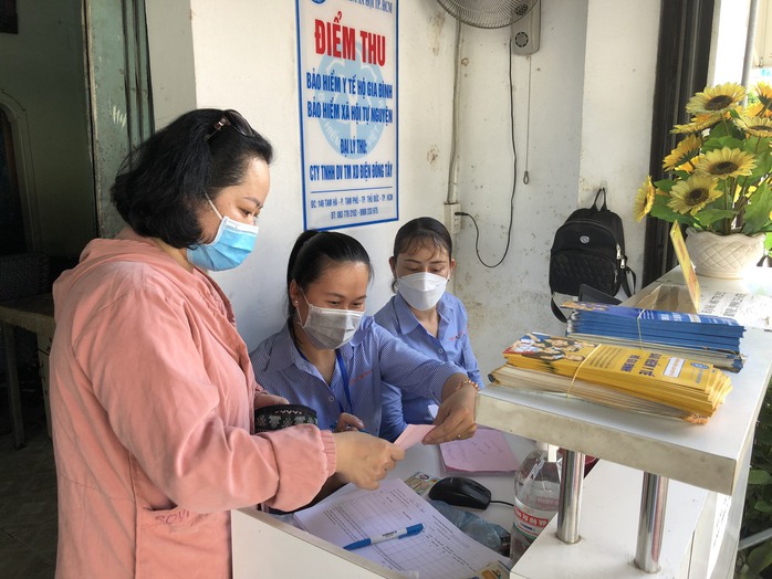 Lưu ý quan trọng khi đóng tiền tham gia BHXH, BHYT tại các điểm dịch vụ thu- Ảnh 2. Lưu ý quan trọng khi đóng tiền tham gia BHXH, BHYT tại các điểm dịch vụ thu- Ảnh 2.