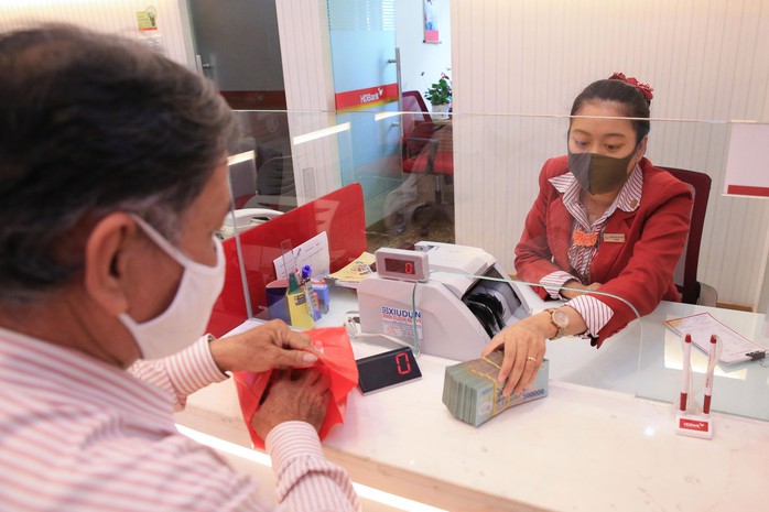 Khơi thông tín dụng cho sản xuất - kinh doanh- Ảnh 4. Khơi thông tín dụng cho sản xuất - kinh doanh- Ảnh 4.
