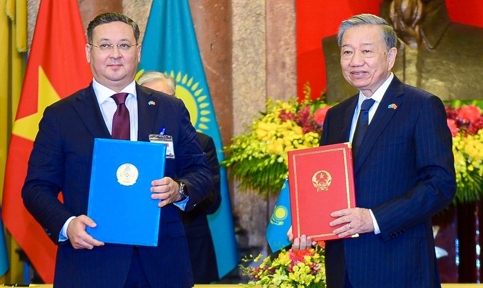 Việt Nam - Kazakhstan ký hiệp định về miễn thị thực - Ảnh 4.