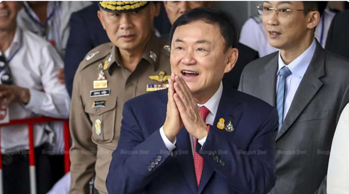 NÓNG: Vua Thái Lan giảm án cho cựu Thủ tướng Thaksin còn 1 năm tù - Ảnh 1.
