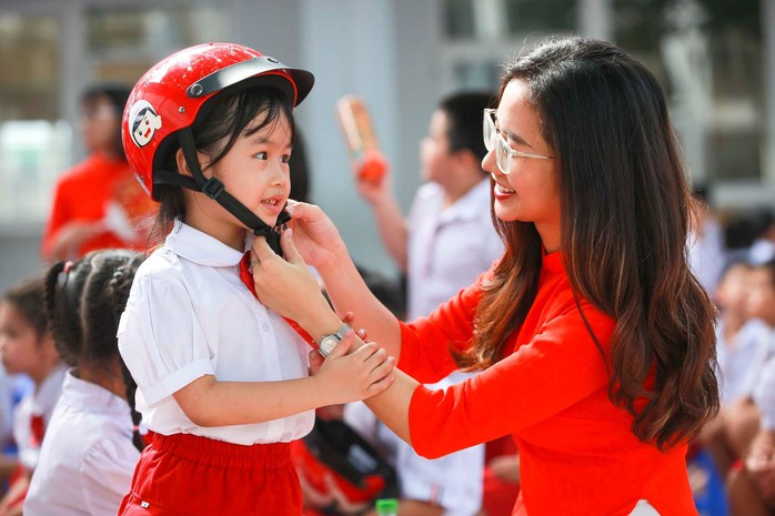 Honda Việt Nam tặng 2 triệu mũ bảo hiểm cho học sinh trên toàn quốc - Ảnh 3.
