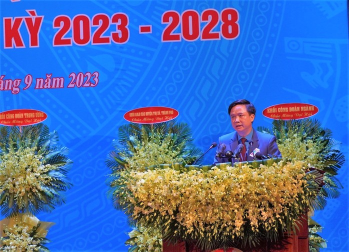 Ông Nguyễn Tiến Nam tái đắc cử Chủ tịch LĐLĐ tỉnh Quảng Bình - Ảnh 2.
