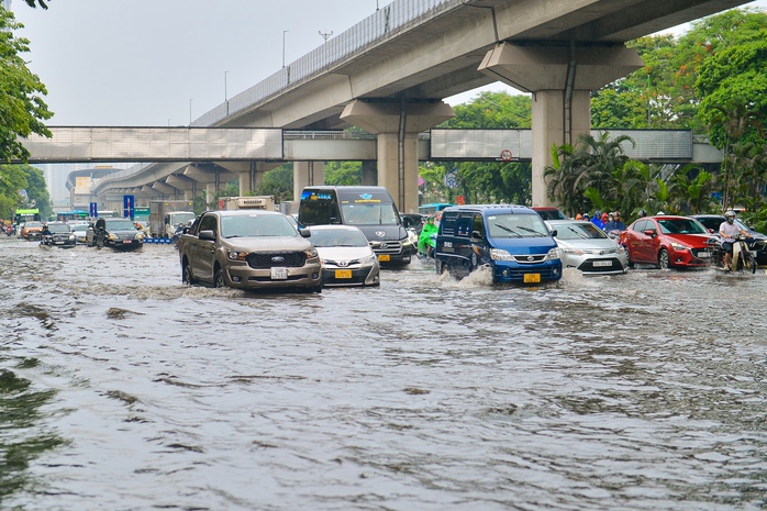 Bắc Bộ, Nam Bộ có mưa to đến rất to - Ảnh 1.