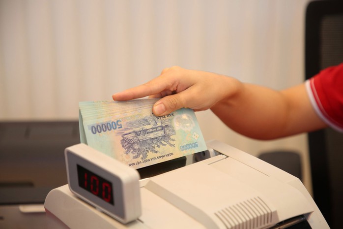 Thị trường trái phiếu doanh nghiệp được kỳ vọng khởi sắc sẽ giảm bớt gánh nặng cung ứng vốn cho nền kinh tế của ngành ngân hàng Ảnh: BÌNH AN Thị trường trái phiếu doanh nghiệp được kỳ vọng khởi sắc sẽ giảm bớt gánh nặng cung ứng vốn cho nền kinh tế của ngành ngân hàng Ảnh: BÌNH AN