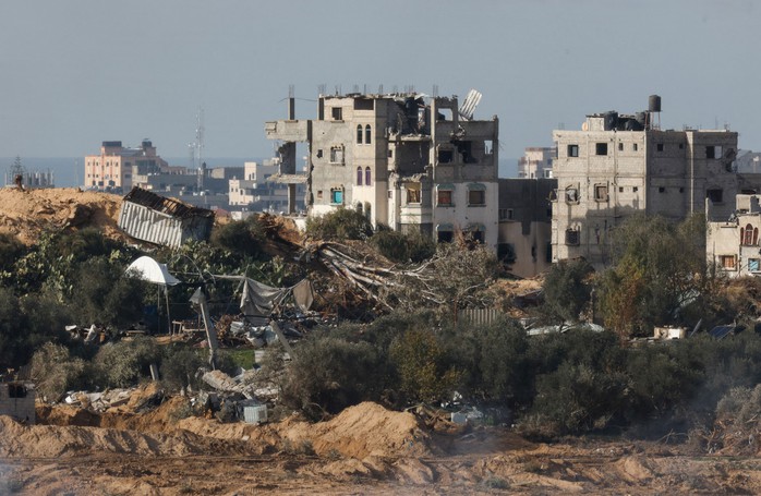 Các tòa nhà bị phá hủy ở miền Trung Dải Gaza hôm 13-1 Ảnh: REUTERS Các tòa nhà bị phá hủy ở miền Trung Dải Gaza hôm 13-1 Ảnh: REUTERS
