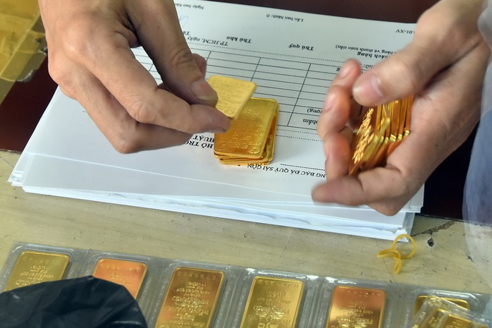 Cuối ngày 18-1, giá vàng SJC bất ngờ tăng mạnh- Ảnh 1. Cuối ngày 18-1, giá vàng SJC bất ngờ tăng mạnh- Ảnh 1.